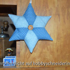 Blauer Patchworkstern mit Knopf
