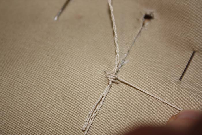 Knopfloch handgenäht